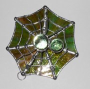 photo of glass spider and web
